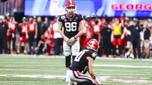 Georgia placekicker Jack Podlesny (96) prepares to attempt a 53-yard field goal with seven seconds remaining against Cincinnati in the Chick-fil-A Peach Bowl Mercedes-Benz Stadium in Atlanta on Friday, Jan. 1, 2020. Podlesny made it, with room to spare and the Bulldogs went on to win 24-21. (Photo by Tony Walsh/UGA Athletics)