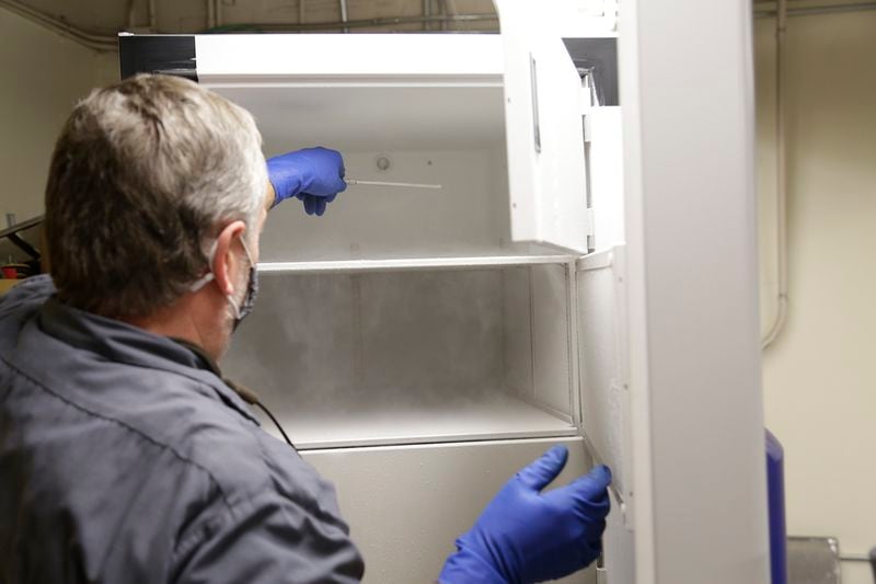 A Northeast Georgia Health System employee prepares a freezer to store Pfizer vaccine doses. (Courtesy of Northeast Georgia Health System)