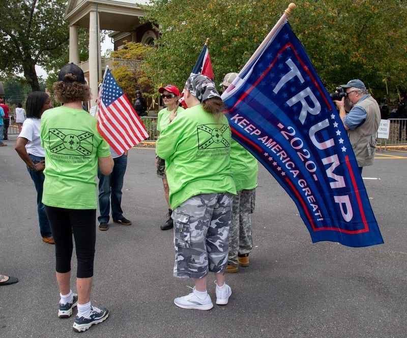 Supporters of President Donald Trump talk at a pro-Trump rally in Dahlonega on Saturday, September 14, 2019. Republican officials and leaders, however, distanced themselves from the event which was affiliated with white nationalists and supremacists. STEVE SCHAEFER / SPECIAL TO THE AJC