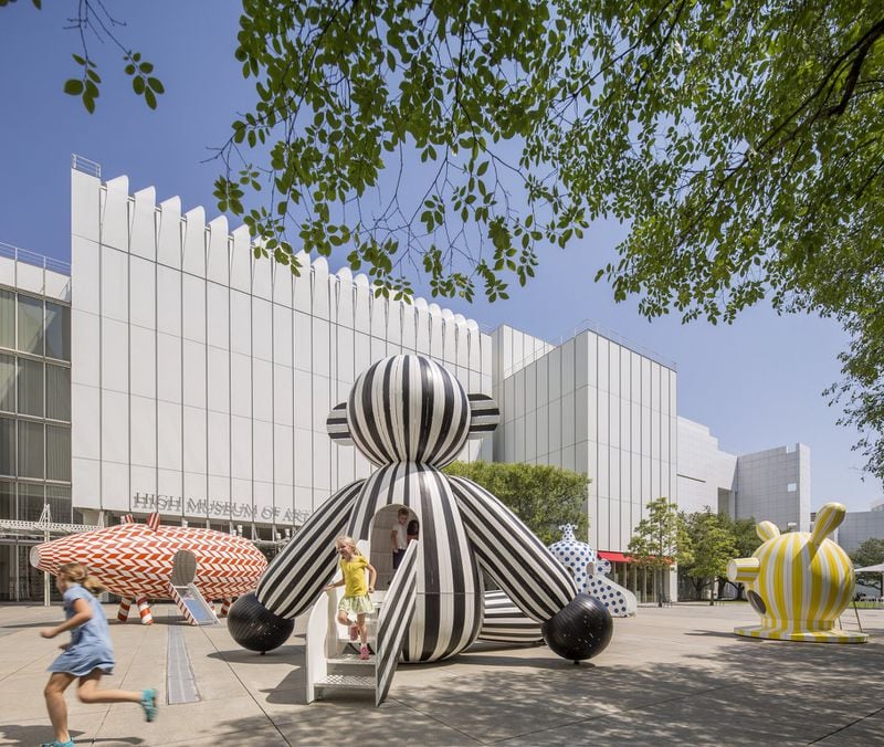 Children scamper in and out of the surreal sculptures/play structures in the courtyard of the High Museum. The installation, by Spanish designer Jaime Hayon, is called “Tiovivo.” The installation’s run has been extended until March 5, 2017. CONTRIBUTED BY JONATHAN HILYER