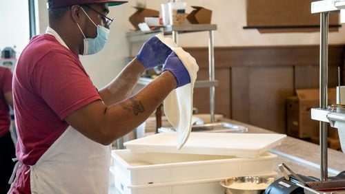 Deshayne Edmondson works on a pizza at the Grana restaurant in Atlanta, Friday 12, 2020. PHOTO: STEVE SCHAEFER FOR THE ATLANTA JOURNAL-CONSTITUTION