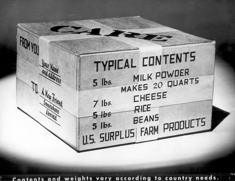 The typical contents of a CARE Package included 5 pounds of milk powder, 7 pounds of cheese, 5 pounds of rice and 5 pounds of beans. AJC file