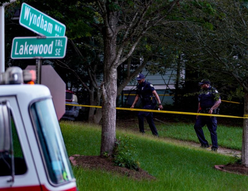 Atlanta police officers investigate a fatal shooting on Wyndham Way on Sunday evening.