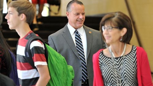 September 24, 2014 Marietta - Interim superintendent Chris Ragsdale (center) meets students and teachers while Congressman Tom Price visits to Wheeler High School on Wednesday, September 24, 2014. Cobb school board members are giving their interim superintendent Chris Ragsdale rave reviews, indicating they will appoint him as the permanent replacement to Michael Hinojosa, who unexpectedly announced he was stepping down from the high profile education job in February. HYOSUB SHIN / HSHIN@AJC.COM