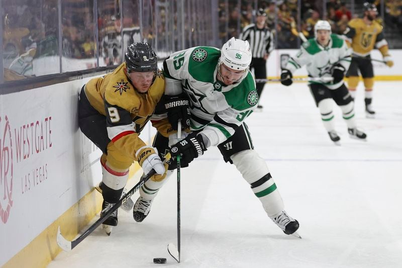 Vegas Golden Knights center Jack Eichel (9) and Dallas Stars center Matt Duchene (95) collide during overtime in Game 3 of an NHL hockey Stanley Cup first-round playoff series Saturday, April 27, 2024, in Las Vegas. (AP Photo/Ian Maule)