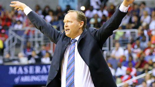 Coach Mike Budenholzer has his team soaring to the Eastern Conference finals after eliminating Washington Friday night. (Curtis Compton, ccompton@ajc.com)