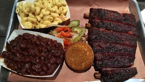 A plate of St. Louis cut ribs, pit beans, and mac and cheese at Loyal Q. CONTRIBUTED BY WYATT WILLIAMS