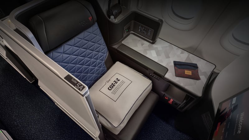 Delta is switching to international business class bedding made of recycled plastic bottles in reusable packaging. Source: Delta