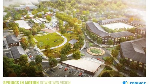 One idea for downtown redevelopment in Powder Springs would involve adding multi-family development near the roundabout to attract restaurants and other businesses. Courtesy of Powder Springs