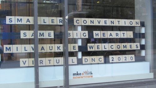 The sign outside the offices of Milwaukee Downtown, a local business group that had expected a windfall from this week's Democratic National Convention.