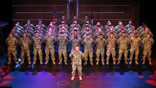 Georgia National Guard troops with the 108th Calvary Regiment form ranks on the stage of Rock Bridge Community Church during a send-off ceremony deploying to Afghanistan on Monday, Nov. 26, 2018, in Dalton. Many other such send-off events will play out across the state in the coming weeks as about 2,200 troops from Georgia’s 48th Brigade head to Fort Stewart for final training and then to a restive part of Afghanistan to join the longest war in America’s history, a fight that is now in its 17th year. Curtis Compton/ccompton@ajc.com