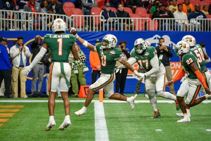 Florida A&M  linebacker Isaiah Major scores a touchdown against Howard in the Celebration Bowl at Mercedes Benz Stadium in Atlanta, Georgia on Dec. 16, 2023. (Jamie Spaar for the Atlanta Journal Constitution)