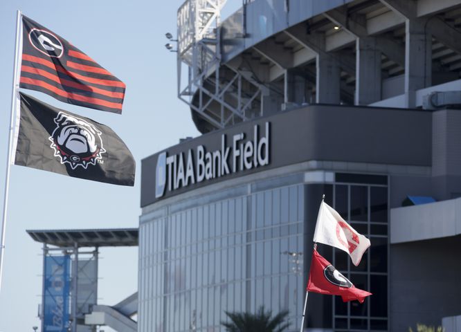 10/30/21 - Jacksonville - Georgia flags fly at the annual NCCA  Georgia vs Florida game at TIAA Bank Field in Jacksonville.   Bob Andres / bandres@ajc.com