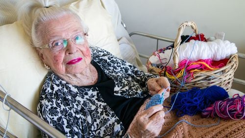 Margrit Ottwiller, 92, has crocheted hats throughout the pandemic to give to charity. 
 PHIL SKINNER FOR THE ATLANTA JOURNAL-CONSTITUTION.
