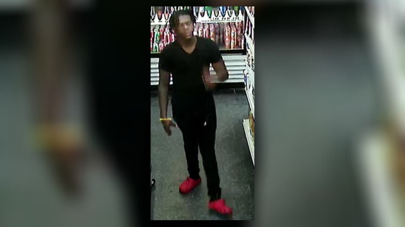 Police are looking to identify a man wanted in connection with a deadly shooting Aug. 30 outside a Vine City convenience store.