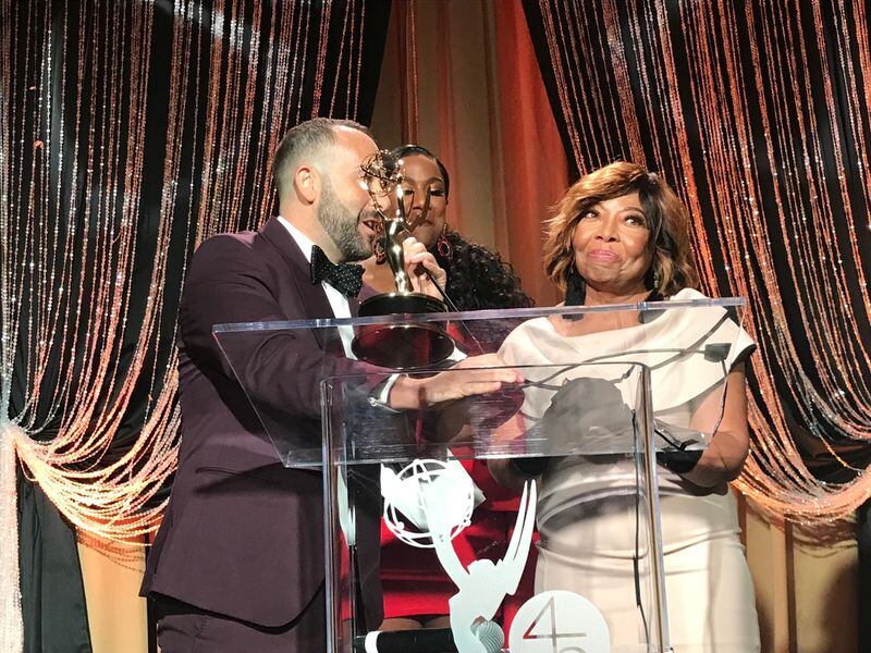 Evelyn Mims, former long-time community services director at 11Alive, has been active with NATAS for many years and Southeast NATAS chapter president and 11Alive reporter Jeremy Campbell gave her a special Emmy for her service. She was not forewarned, thus her facial expression.