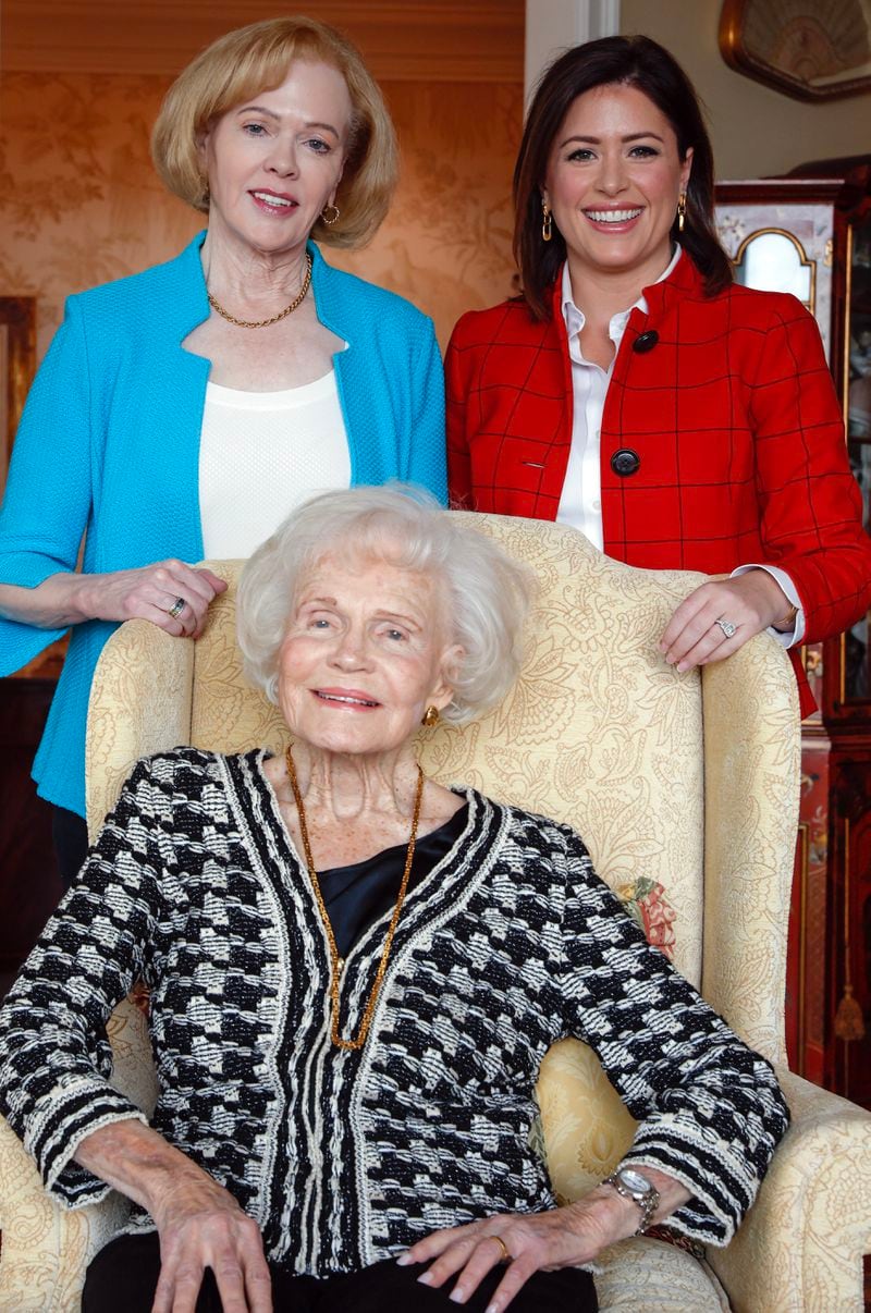 Anna Murphy, the widow of World World II veteran Frank Murphy poses for a photo with her daughter Elizabeth Murphy (left) and her granddaughter Chloe Melas (right) in her home in Buckhead on Thursday, January 26, 2023.  (Natrice Miller/natrice.miller@ajc.com) 