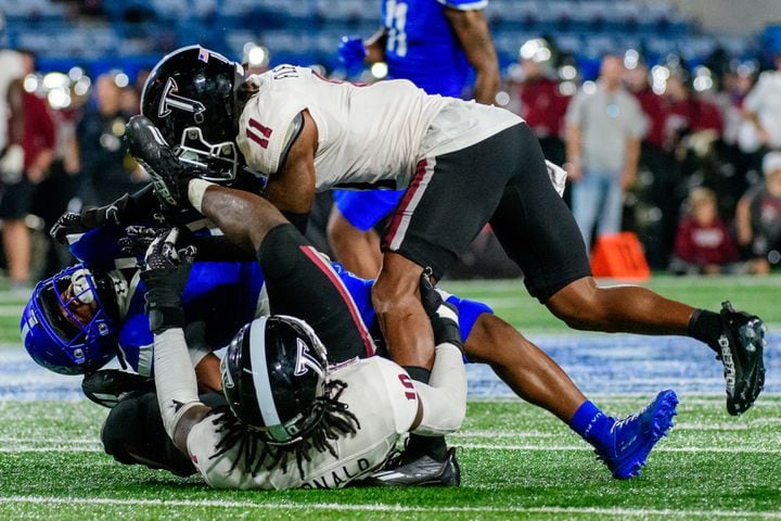 Georgia State's Kevin Swint is tackled against Troy Saturday, Sept. 30, 2023 (Jamie Spaar for the Atlanta Journal Constitution)
