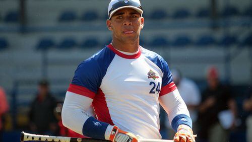 The Braves are counting down the days till the arrival of Hector Olivera, the 30-year-old Cuban who could be in their lineup in another week or so. (AP Photo)