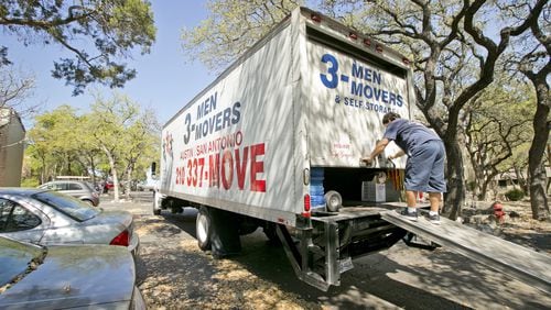 Omar Arroyo of 3-Men Movers closes his truck after moving in a new resident from Round Rock into Westdale Creek Apartments in Austin in March. Though the Texas House and Senate’s spending plans disagree on the final amount, “more important is the fact that both chambers have constructed budgets that at least on paper keep spending increases to less than population growth plus inflation,” write Bill Peacock and Vance Ginn of the Texas Public Policy Foundation.