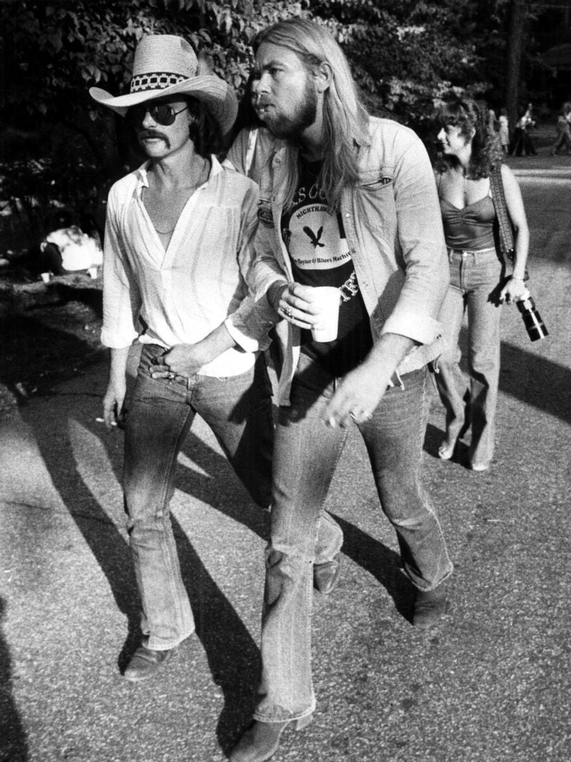 Aug. 24, 1978 - L-R: Dickey Betts and Gregg Allman reunited at the Capricorn picnic in 1978. (Jerome McClendon/AJC staff)