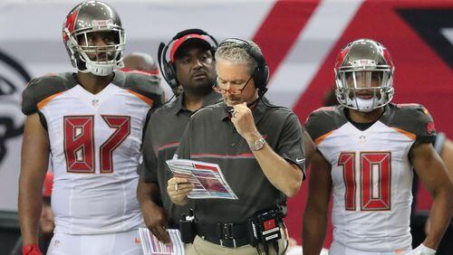 Tampa Bay Buccaneers coach Dirk Koetter apologized Thursday for a team tweet that mocked the Falcons' blown lead in February's Super Bowl.   Curtis Compton /ccompton@ajc.com