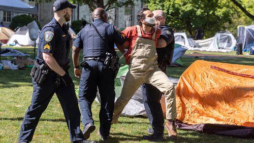 Police arrest Pro-Palestinian protestors who set up an encampment at the Emory Campus in Atlanta on Thursday, April 25, 2024. (Arvin Temkar/Atlanta Journal Constitution/TNS)