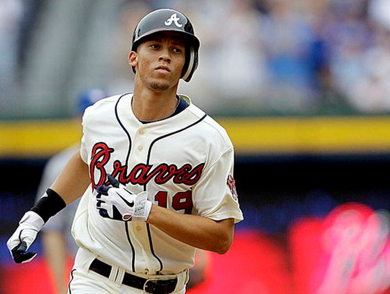 Atlanta Braves' Andrelton Simmons rounds the bases after hitting his first major league career home run in the seventh inning of a baseball game against the Toronto Blue Jays, Saturday, June 9, 2012, in Atlanta. (AP Photo/David Goldman) Andrelton Simmons homered and tripled Sunday, and still hasn't struck out this season through 40 plate appearances.