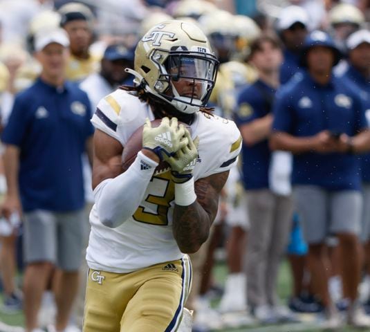 D.J. Moore pulls in a long pass for a touchdown during Georgia Tech's spring football game in Atlanta on Saturday, April 15, 2023.   (Bob Andres for the Atlanta Journal Constitution)