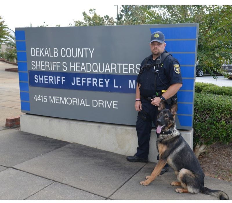 Deputy Phillip Snow, a 22-year veteran of the DeKalb County Sheriff's Office, and his K-9 partner, Tomi, were involved in a crash Friday morning on Covington Highway. 