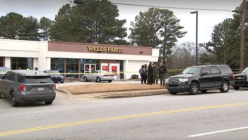 A man was found dead in a vehicle in the parking lot of a Wells Fargo bank in South Fulton on Friday morning, police said.