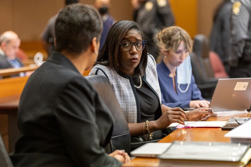 Deputy district attorney Simone Hylton (center) appears at a hearing for the YSL RICO case at the Fulton County Courthouse in Atlanta on Thursday, December 15, 2022. Hylton read Wunnie Lee's negotiate guilty plea agreement on Friday. (Arvin Temkar / arvin.temkar@ajc.com)