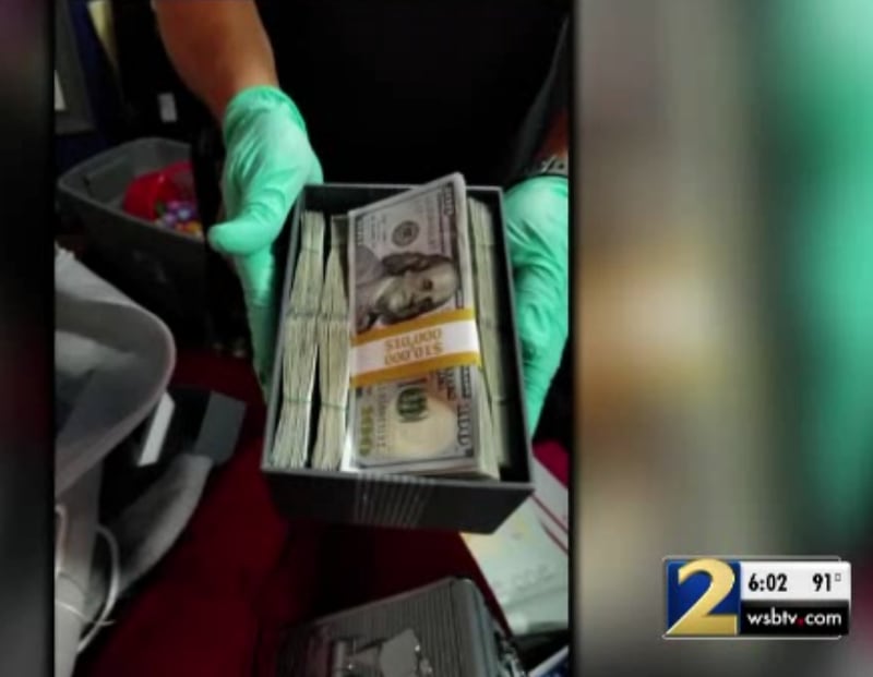Almost $250,000 in cash was seized from one of the homes.