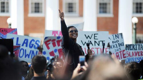In this file photo, Sunny Fowler speaks during a rally by Ole Miss students calling on the university to remove the Mississippi state flag from university grounds, in Oxford, Miss. Bruce Newman/The Oxford Eagle via AP