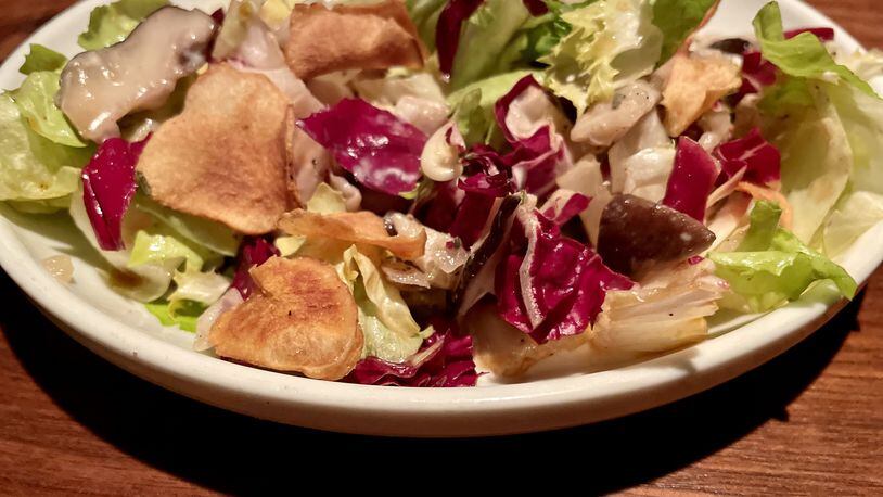 BoccaLuppo offers marinated mushrooms with escarole, crispy sunchokes and goat cheese. Angela Hansberger for The Atlanta Journal-Constitution