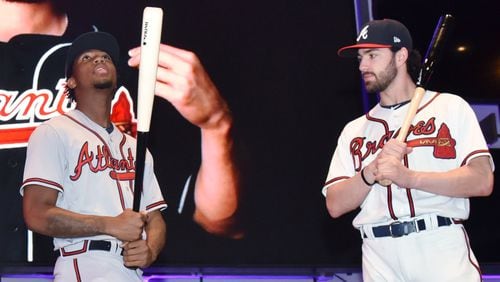 Braves Ronald Acuna (left), wearing road gray uniform, and Dansby Swanson, in home whites, pose during 2019 Uniform Showcase event at LIVE! at The Battery Atlanta as a part of Chop Fest Saturday, Jan. 19, 2019, in Atlanta.