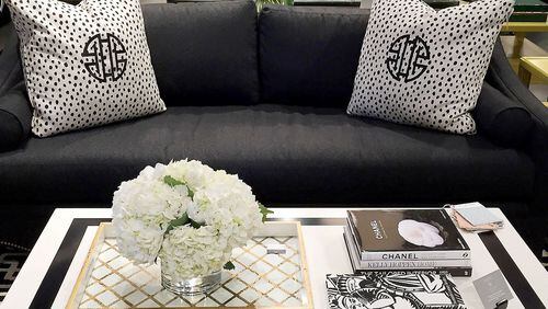 A Tobi Fairley coffee table is paired with her Eva sofa for C.R. Laine in Derek Onyx fabric. (Patricia Sheridan/Pittsburgh Post-Gazette/TNS)