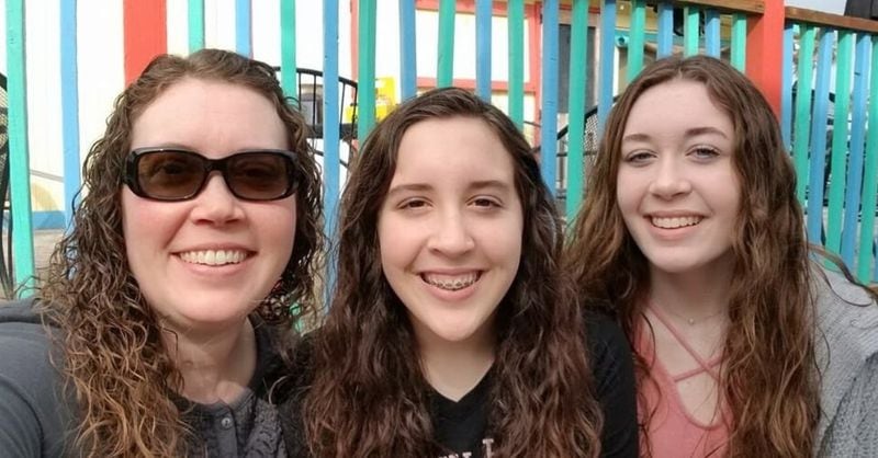 This photo, from a family member’s GoFundMe page, shows (from left) Tracy Lynne Runnels and her daughters, ages 13 and 16. Runnels died Thursday and the 16-year-old was shot in the face. The girls’ father has asked for their names not to be used. (From GoFundMe public page)