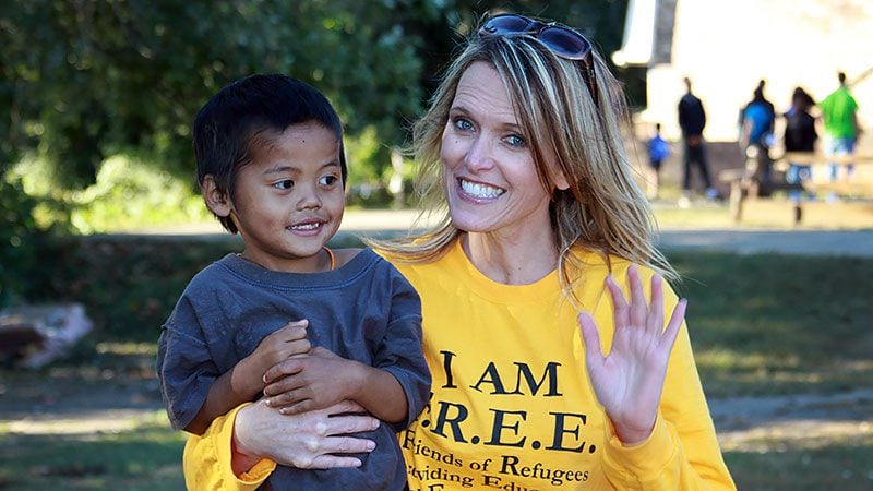 Kelli Czaykowsky shares a light moment with one of the refugee children in Clarkston. (Courtesy of Allen Clark)
