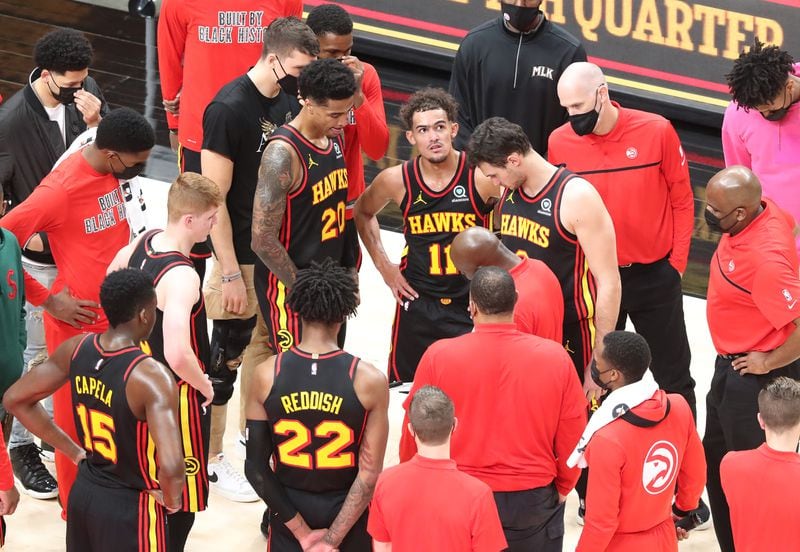The Atlanta Hawks huddle up for a time out during the final minute of a 107-99 loss to the Los Angeles Lakers Monday, Feb.1, 2021, in Atlanta.   Curtis Compton / Curtis.Compton@ajc.com”