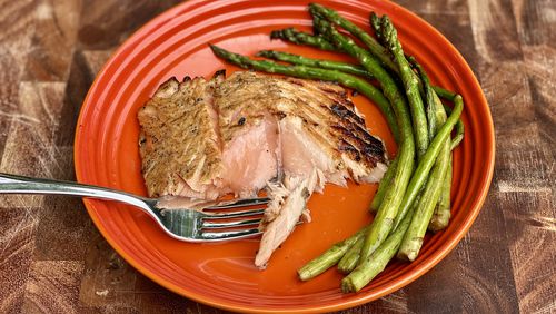 Tired of the same-old grill recipes? This miso-marinated salmon tastes salty, sweet and summery. (Kellie Hynes for The Atlanta Journal-Constitution)