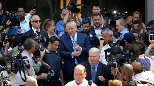 Republican presidential candidate Donald Trump leaves for lunch after being summoned for jury duty in New York earlier this week. Trump was due to report for jury duty Monday in Manhattan. AP/Seth Wenig