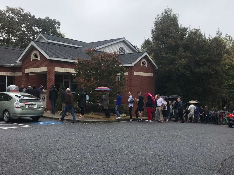 The line to vote at the Vinings library in Cobb County just after 11 a.m. on Tuesday, Nov. 6, 2018.