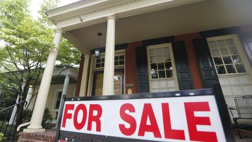 Home prices continue to climb in most metro Atlanta neighborhoods. (AP Photo/Steve Helber)