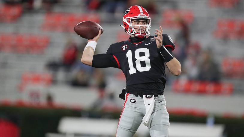 11/21/20 - Athens -  Georgia Bulldogs quarterback JT Daniels (18) warms up before a NCCA football game between the Georgia Bulldogs and the Mississippi State Bulldogs on Saturday, Nov. 21, 2020 at Sanford Stadium in Athens.    (Curtis Compton / Curtis.Compton@ajc.com)  