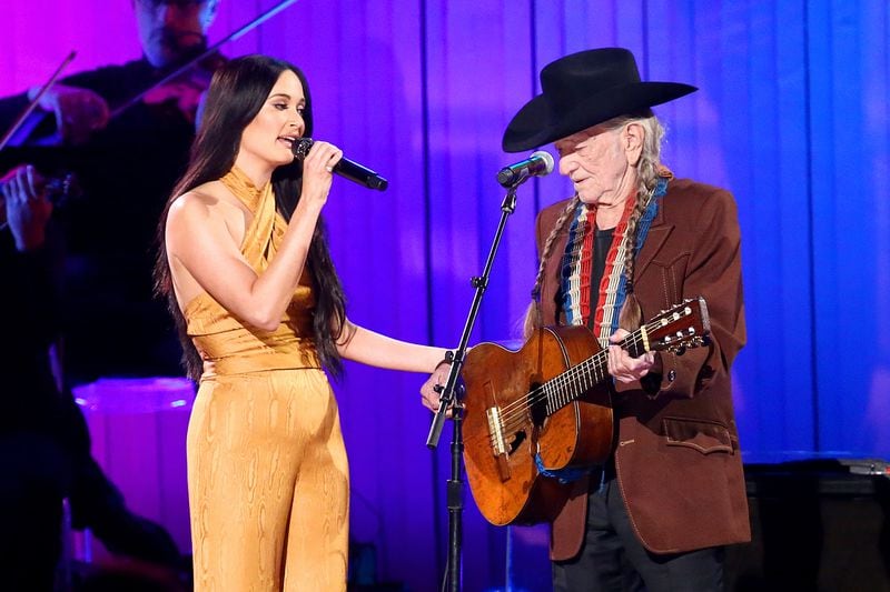 Kacey Musgraves and Willie Nelson perform onstage during the 53rd annual CMA Awards at the Bridgestone Arena on November 13, 2019 in Nashville, Tennessee. (Photo by Terry Wyatt/Getty Images,)