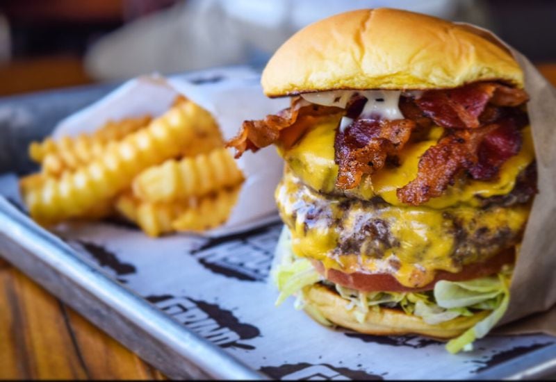 One of the favorite Grindhouse Killer Burgers features cheddar cheese, Applewood bacon and two patties.
Courtesy of Grindhouse Killer Burgers.
