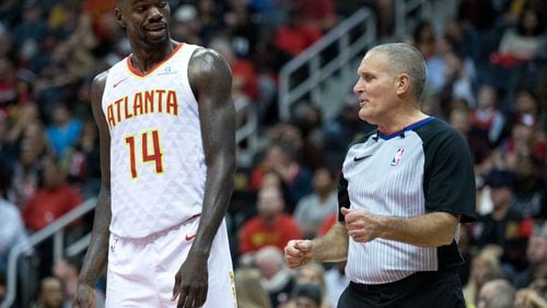 Atlanta Hawks center Dewayne Dedmon (14) argues with a referee during an NBA game against the Denver Nuggets at Philips Arena, Friday, Oct. 27, 2017, in Atlanta.  BRANDEN CAMP/SPECIAL