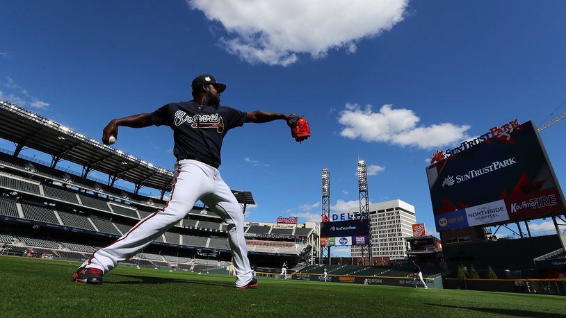 Braves pitcher Arodys Vizcaino warms up during batting practice before a MLB exhibition game against the N.Y. Yankees for the soft opening of SunTrust Park on Friday, March 31, 2017, in Atlanta. Curtis Compton/ccompton@ajc.com
