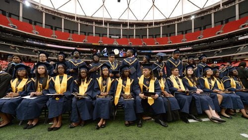 Charles Drew High School students wait for their names to be called during commencement exercises inside the Georgia Dome in this 2013 file photo. All Clayton County high schools will hold 2017 graduations at the International Convention Center in College Park.